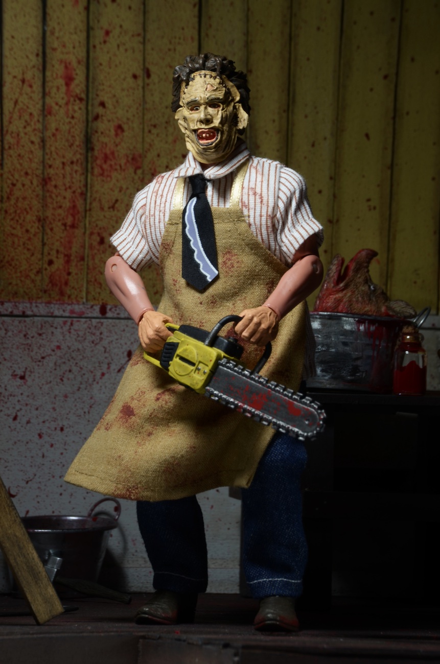 The 8" Leatherface figure wears his classic outfit from the gory 1974 ...