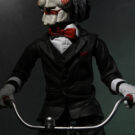 NECAOnline.com | Saw - 12" Action Figure with Sound - Puppet on Tricycle