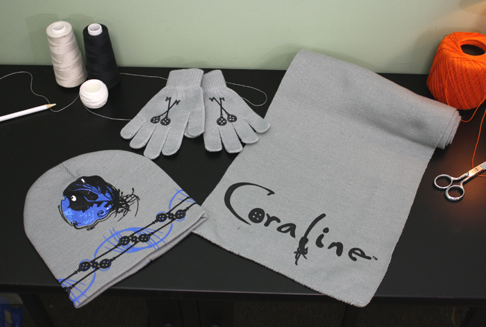NECAOnline.com | DISCONTINUED: Coraline – Hat, Scarf and Gloves Set – Blue Key